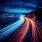 Urban energy Long exposure photo showcases car light trails at night