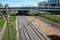 Urban industrial landscape railroad tracks and platform on sunny summer day