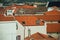 Urban landscape with rooftops of old whitewashed houses