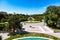 Urban landscape of the spanish city of Zaragoza on a warm spring day with fountains in the landmark park