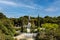 Urban landscape of the spanish city of Zaragoza on a warm spring day with fountains in the landmark park