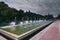 Urban landscape of the spanish city of Zaragoza on a warm spring day with fountains in the landmark park