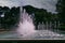 Urban landscape of the spanish city of Zaragoza on a warm spring day with fountains in the landmark park