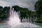 Urban landscape of the spanish city of Zaragoza on a warm spring day with fountains in the landmark park