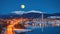 Urban landscape of Tromso in Northern Norway with full moon, Generative AI