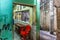 Urban location in a narrow backstreet with derelict buildings in the Rocinha favela in Rio de Janeiro, Brazil, South America