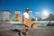 Urban longboarding in concrete skatepark