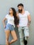 Urban loving couple. Couple stylish young modern people. Couple white shirts lean each other. Hipster bearded and