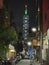 Urban Majesty: Taipei 101 Tower Rising Amidst City Alleyways at Night.
