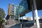 Urban outdoor grand staircase under modern glass facade architecture of University of Sydney Law School, Australia