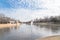 Urban park bare tree, altocumulus cloud, fountain lake in Texas, USA