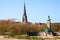 Urban park. Spring in Copenhagen, Denmark. Langelinie park near St. Alban& x27;s Church.