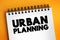 Urban planning - process that is focused on the development and design of land use and the built environment, text concept on