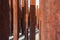 Urban Rusted Metal Poles With Blue Background