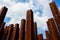 Urban Rusted Metal Poles With Blue Background