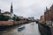 Urban scene with river and old warehouse city district in hamburg, germany