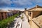 Urban scenery of facade buildings in Olite, Spain under a gloomy sky