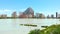 Urban skyline of Calpe, Penon de Ifach or Penyal de Ifac rock, salt lake with flock of flamingos birds, blue sky, warm sunny day,