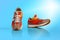 Urban sports shoes over blue background. Sneakers or trainers isolated. Athletic shoes. fitness, sport, training concept