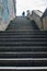 Urban staircase going up and human silhouette