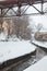 Urban stream in winter. The Lybid river