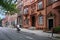 Urban street with old brownstone style townhouses