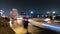 Urban timelapse of Cairo city with car traffic and people walking on sidewalk at night. Egypt