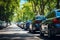 urban traffic jam on a summer day from cars idling and polluting the air with exhaust emissions,the concept of automotive