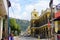 Urban view of a busy narrow street with traditional shops in a  village in Guatemala