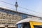 Urban yellow tram at alexanderplatz berlin germany