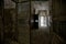 urbex, disturbing corridor of an abandoned asylum, in Italy