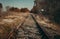 Urbex photo of abandoned, old and damaged train rails in country landscape with blue cloudy sky on background. Train rails