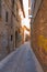 Urbino, Italy - August 9, 2017: A small street in the old town o