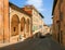 Urbino, Italy - August 9, 2017: A small street in the old town of Urbino. sunny day.