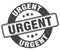 urgent stamp. urgent label. round grunge sign