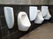 Urinal bowls are installed in men`s public toilets.