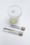 Urine tests in medical test tubes on white background