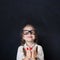 Ð¡urious Girl in Glasses Showing Hands with Thumb Up and Smiling
