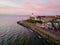 Urk lighthouse with old harbor during sunset, Urk is a small village by the lake Ijsselmeer in the Netherlands Flevoland