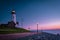 Urk Netherlands, lighthouse of Urk on a bright summer day with no people by the lake ijsselmeer