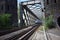 Urmitz, Germany - 08 22 2022: fast freight train engine on an old bridge