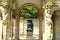 Urn and sculptured archway at Hever Castle Garden in England