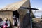 Uros, Peru Traditional reed boat with tourists on Lake Titicaca near the Uros floating islands, Puno, South America