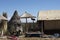 Uros, Peru - Traditional Totora boat with tourists on Titicaca lake near to the Uros floating islands , Puno, Peru,