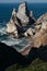 Ursa Beach Sea stack, Portugal. Atlantic Ocean Foamy waves rolling to rocks. Holiday vacation landscape scene