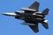 US Air Force F-15 Eagle fighter jet in flight over Leeuwarden Air Base. March 28, 2017