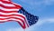 US American flag on blue sky background. For USA Memorial day, Veterans day, Labor day, or 4th of July celebration. Top view, copy