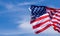 US American flag on blue sky background. For USA Memorial day, Veterans day, Labor day, or 4th of July celebration. Top view, copy