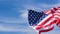 US American flag on blue sky background. For USA Memorial day, Veterans day, Labor day, or 4th of July celebration. Top view, copy