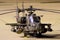 US Army Boeing AH-64E Apache Guardian attack helicopter on the tarmac during a nightstop at Eindhoven Airport. The Netherlands -